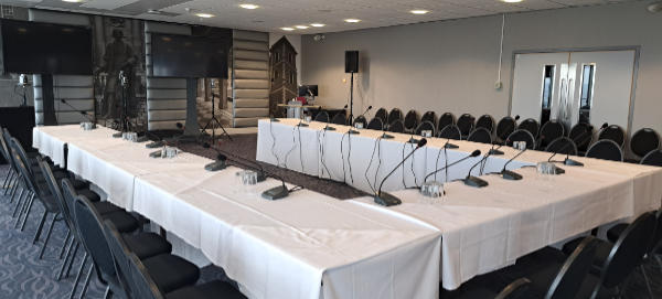 Gooseneck microphones on table