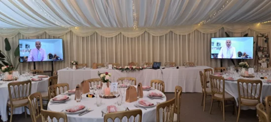 Projector screens at wedding event